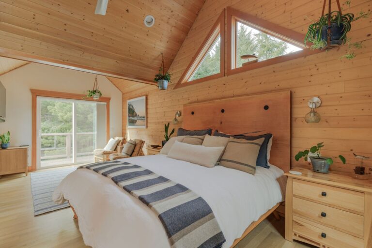 A truly massive center cut slab headboard, one of many singular touches throughout this room