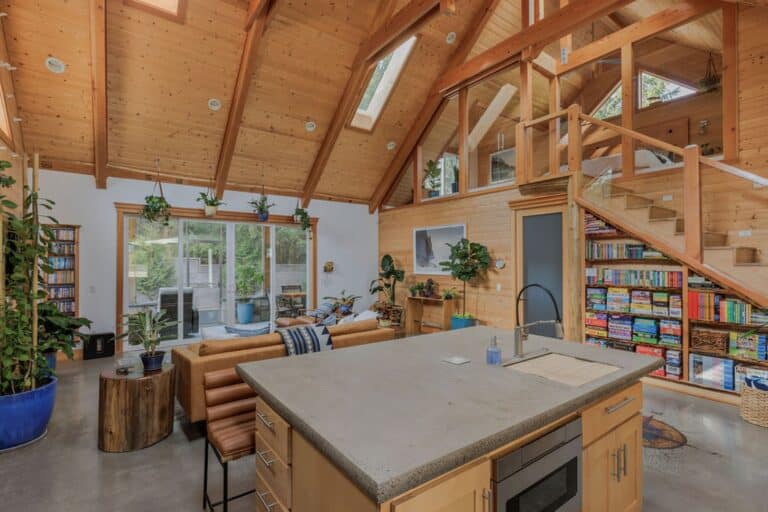 Cook in the kitchen while visiting with other guests in the great room