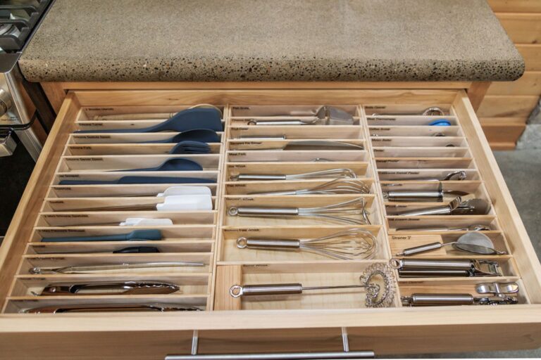 Highly stocked and organized cabinet drawers