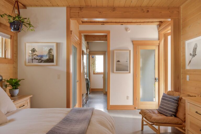 The open doorway leads to the master bathroom