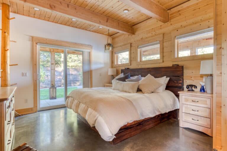 The king bed was built by a local craftsman with salvaged logs, specially commissioned for this room.