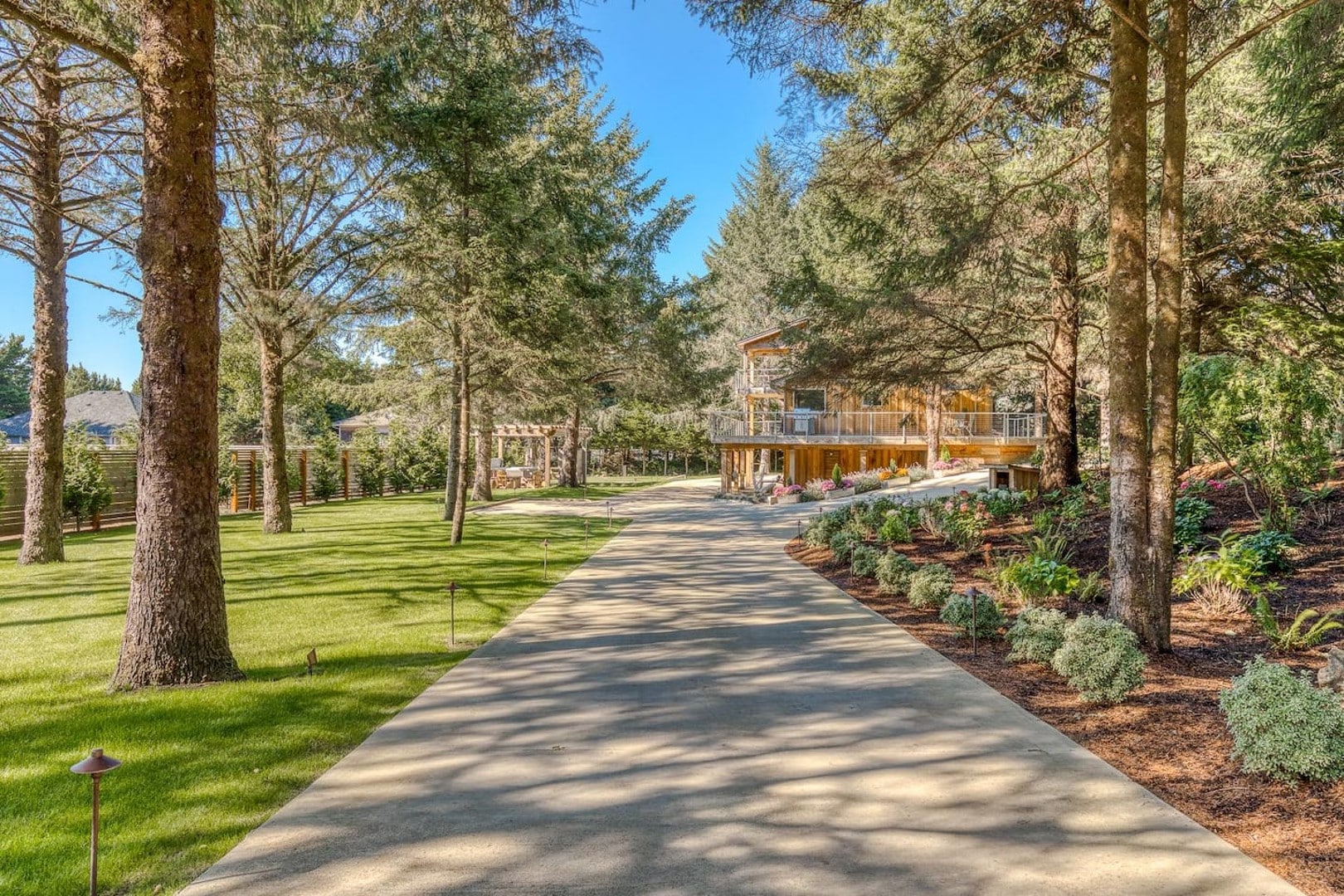 Beach Cabin - Enjoy the properties retreat like vibe with a large front lawn and mature evergreen trees