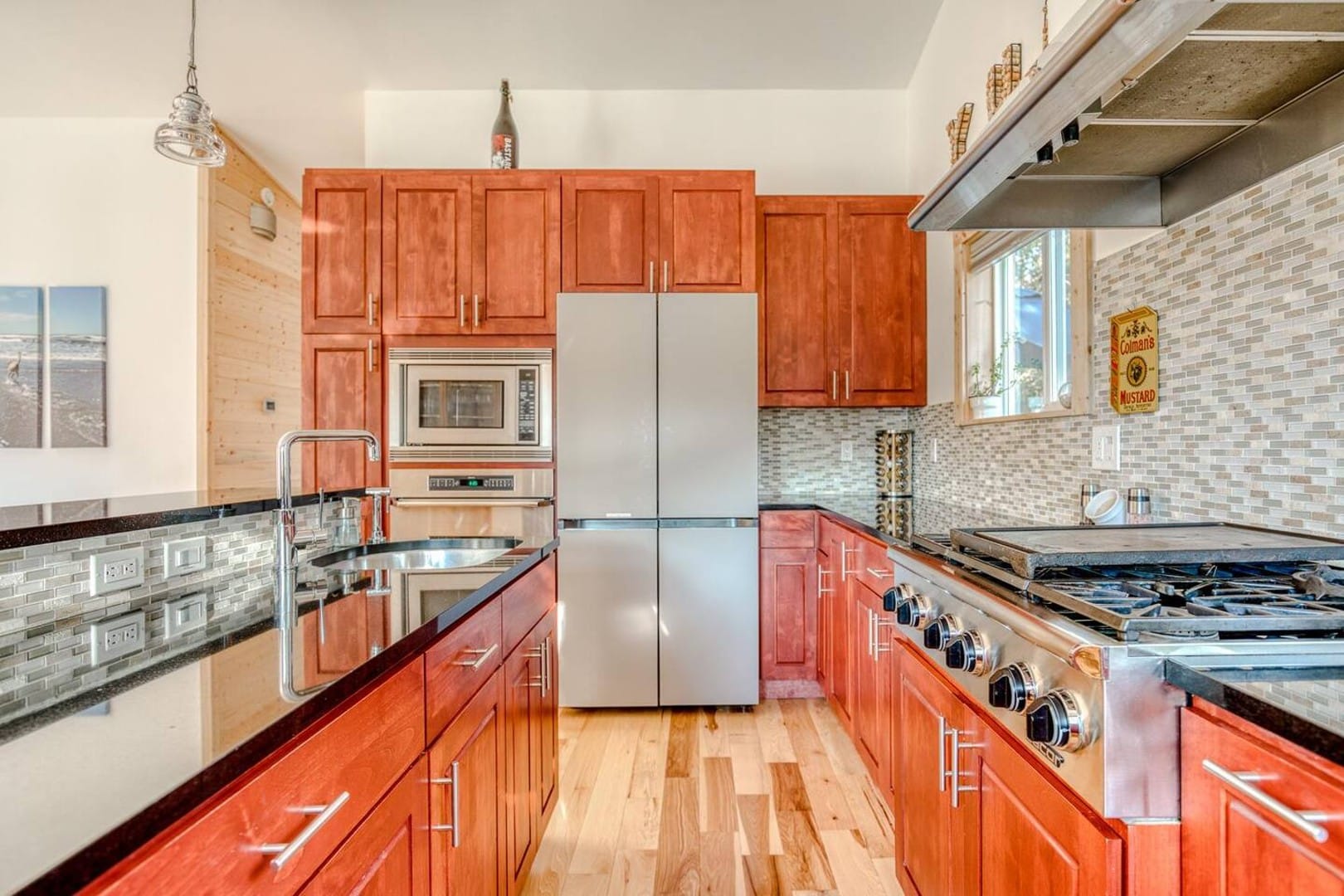 Beach Cabin - Gas stove top and a large variety of stainless and cast iron pots and pans