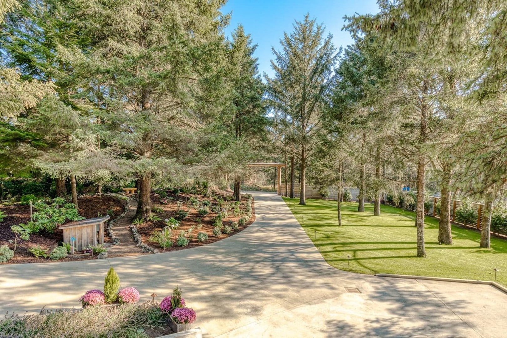 Beach Cabin - The East portion of the yard has a garden path that meanders through the trees
