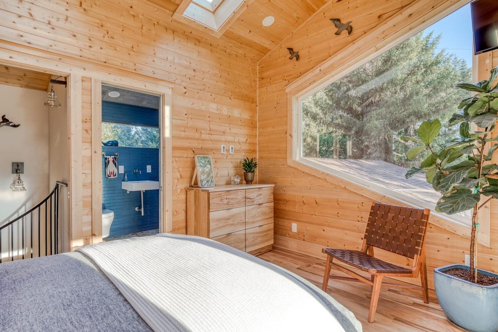 Beach Cabin - The Loft has skylights, lots of houseplants, and a private bathroom