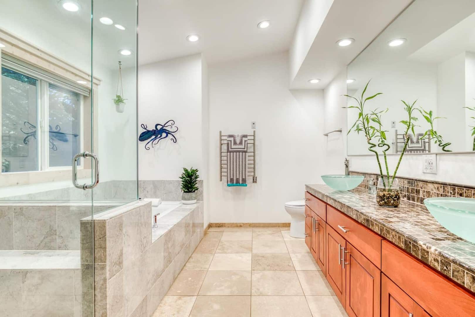 Beach Cabin - The downstairs master bath has heated floors and a heated towel bar