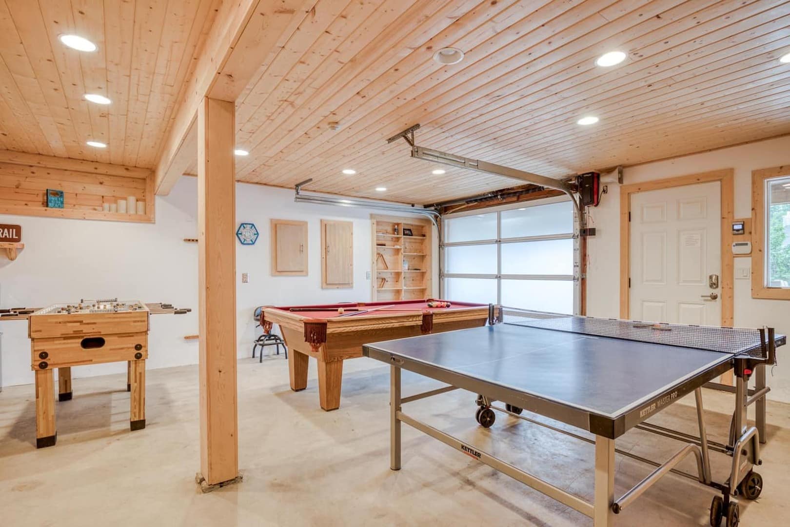 Beach Cabin - The garage has been converted to a heated game room with a TV and sound bar